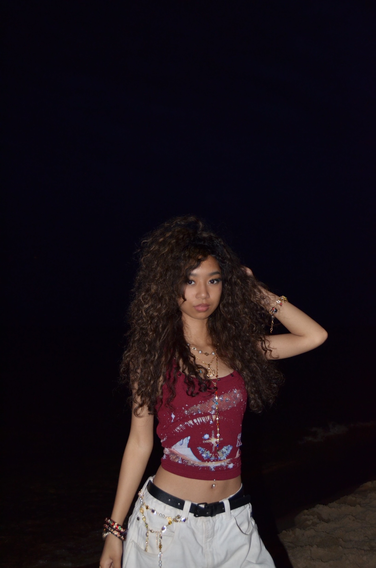 Inaya — beach night editorial frame