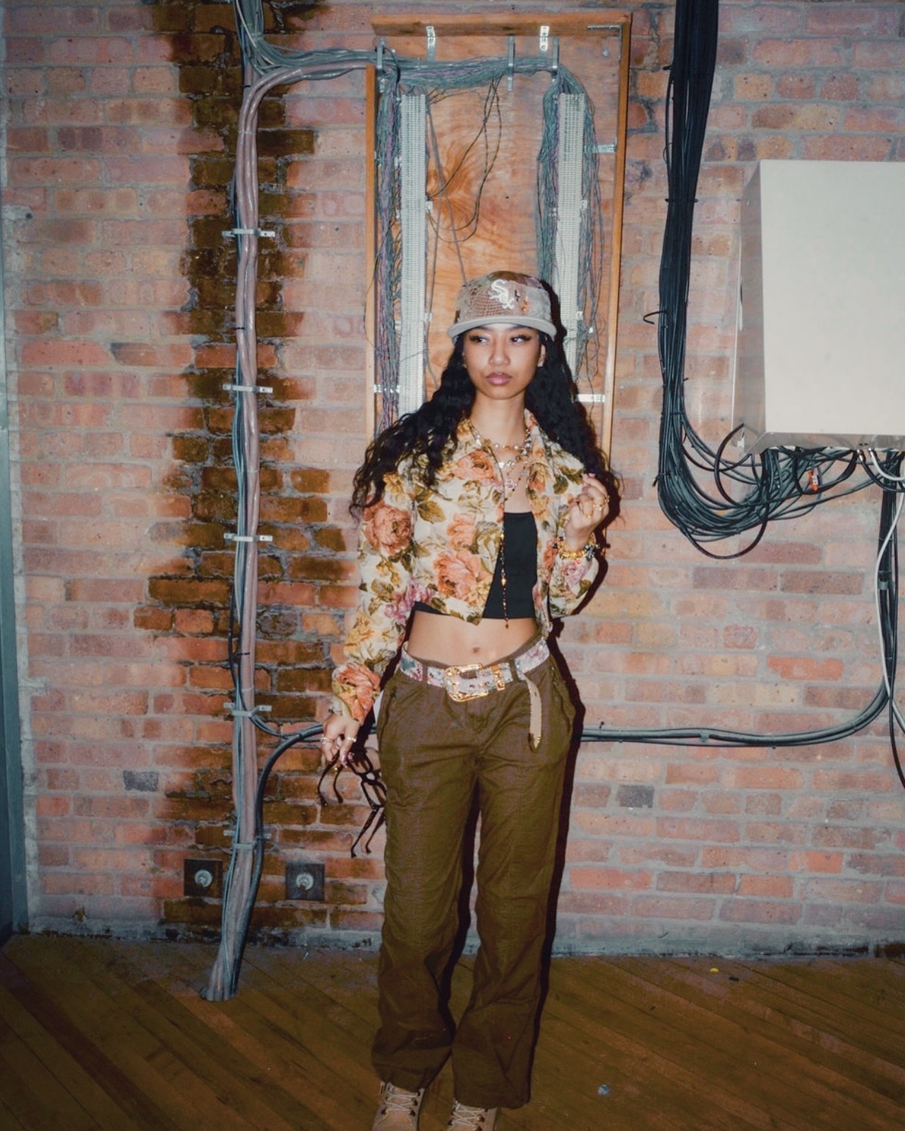 Inaya Malik in floral jacket and cargo styling — Chicago